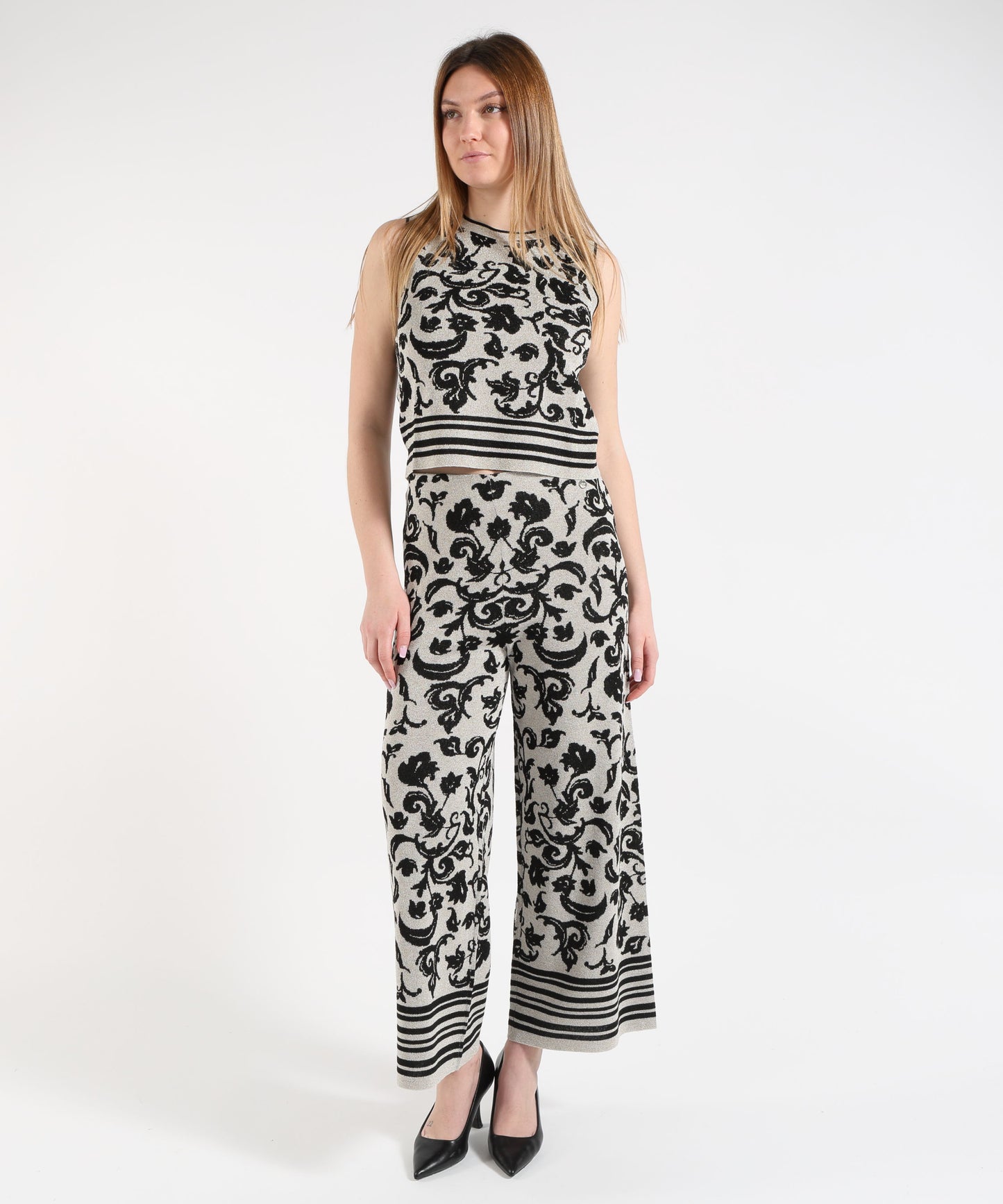 LIUJO WHITE Pantalone cropped in maglia con stampa floreale