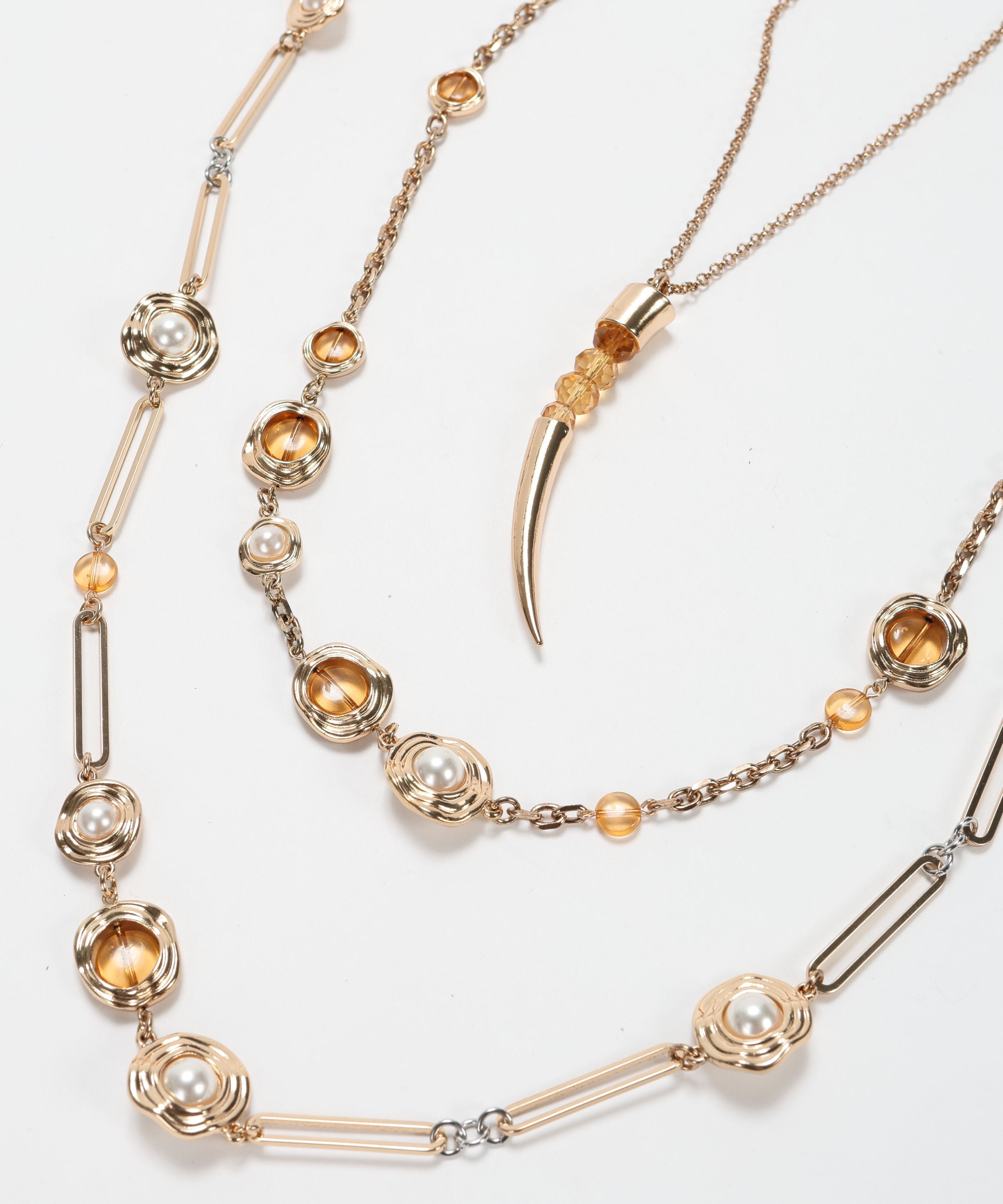 Necklaces CLIPS Long Gold Three-Strand Necklace with Amber-Colored Stones, Pearls and Charms Oro | CLIPS