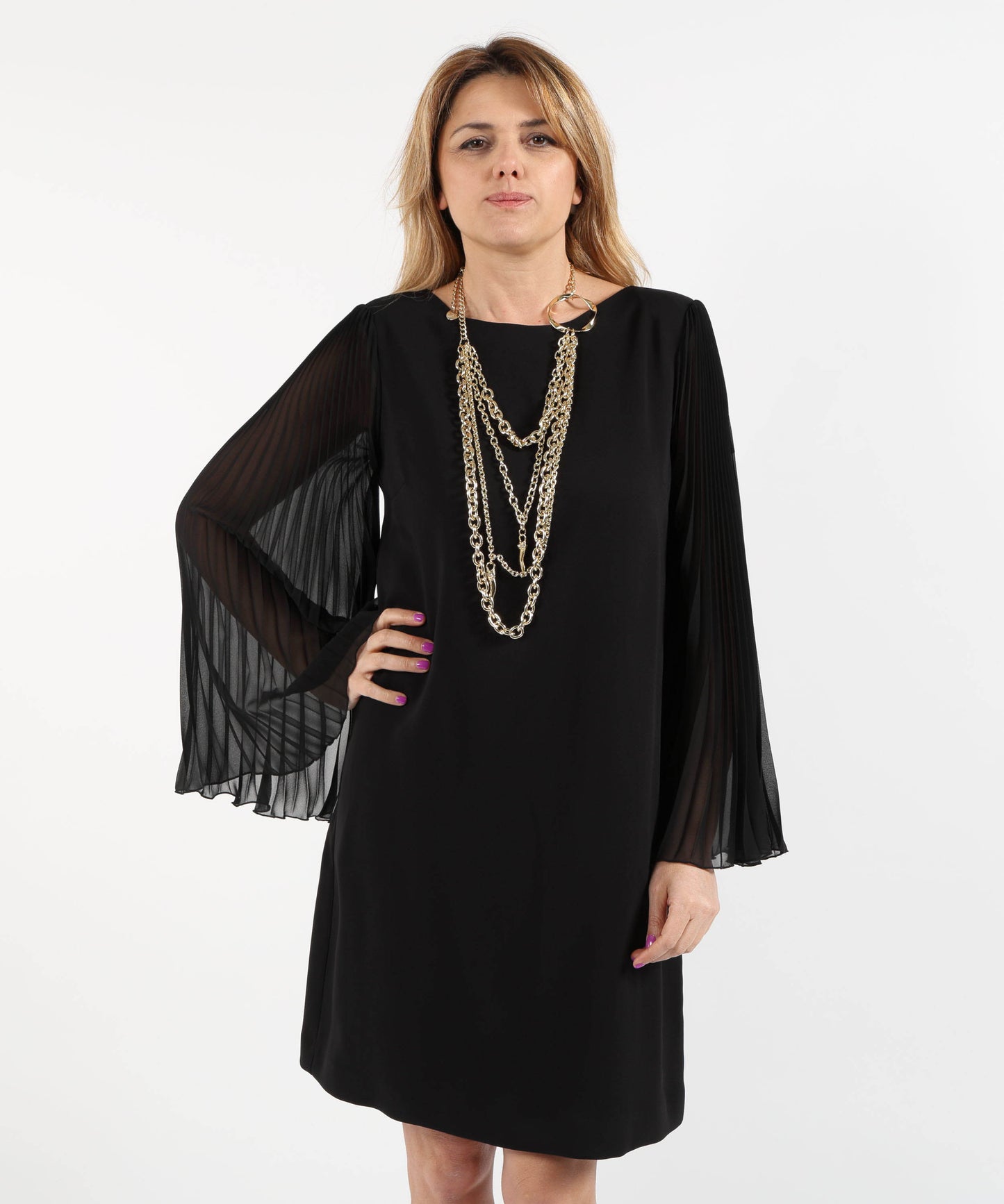 CLIPS Long Gold Four-Strand Necklace with Central Ring and Decorative Pendants”