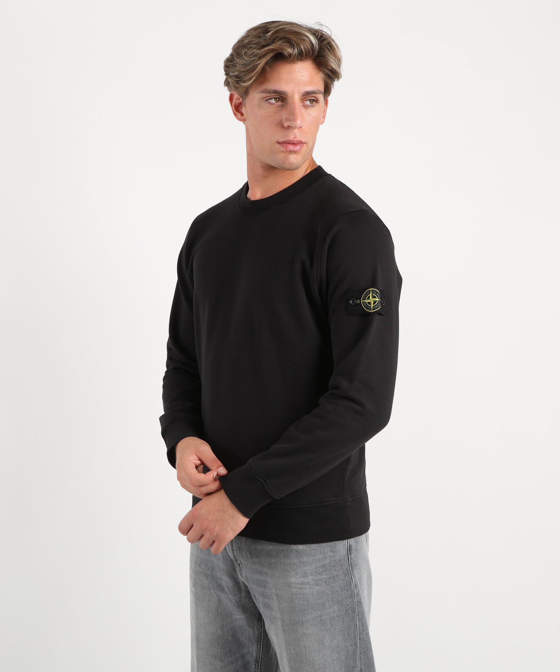 Felpe STONE ISLAND Felpa girocollo regular fit con polsini elasticizzati Nero | STONE ISLAND
