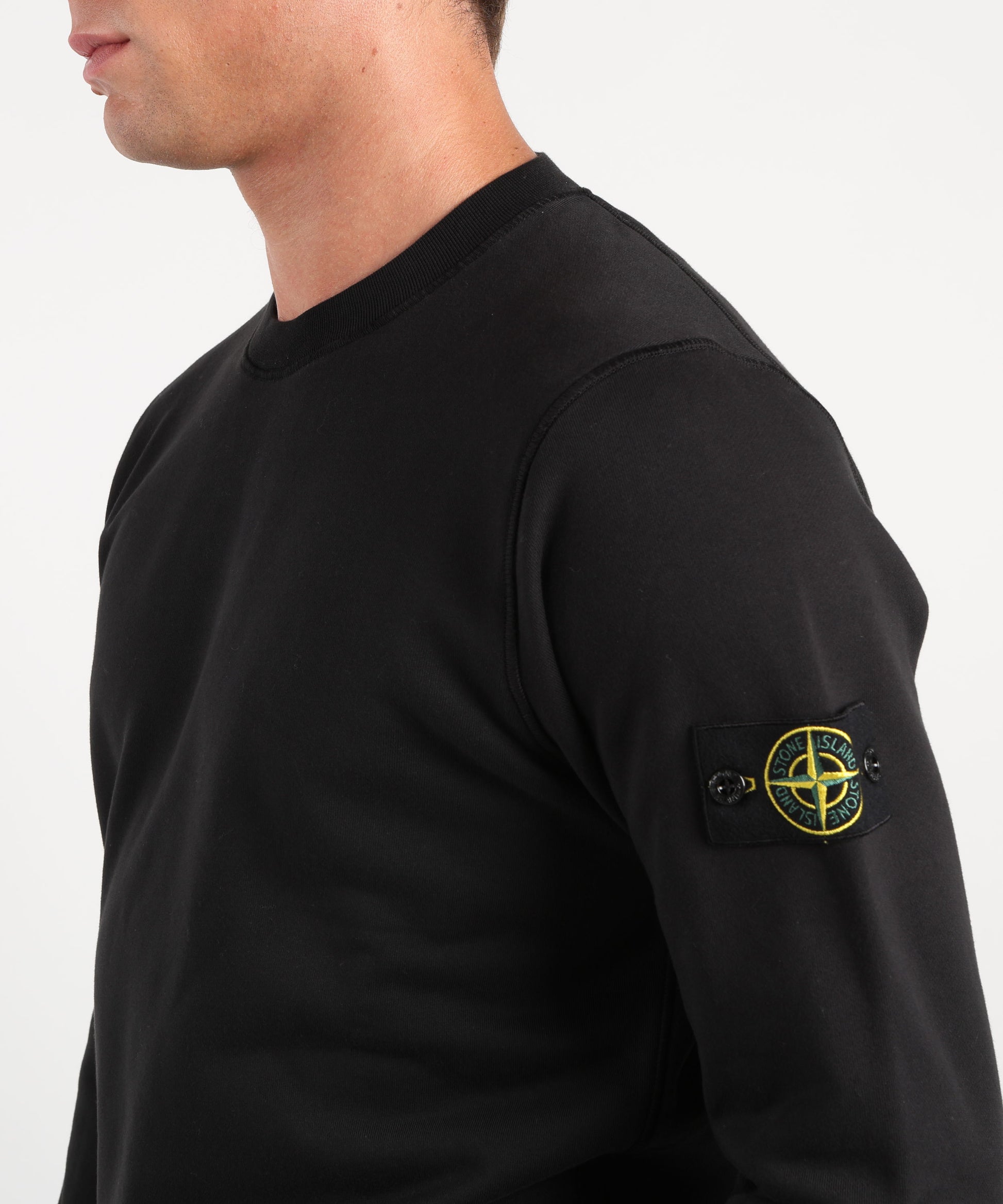 Felpe STONE ISLAND Felpa girocollo regular fit con polsini elasticizzati Nero | STONE ISLAND