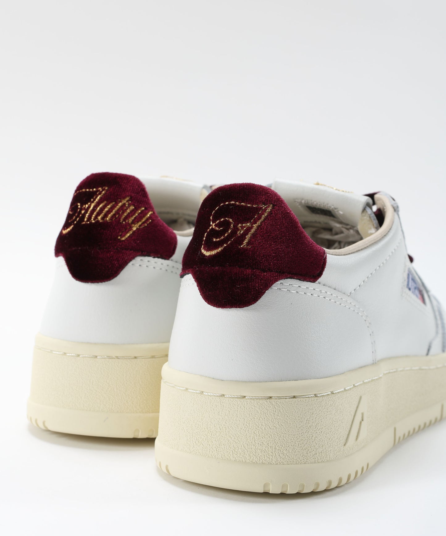 AUTRY MEDAGLIA AUTRY SNEAKERS FEMMINILI IN PELLE VIOLA BIANCA