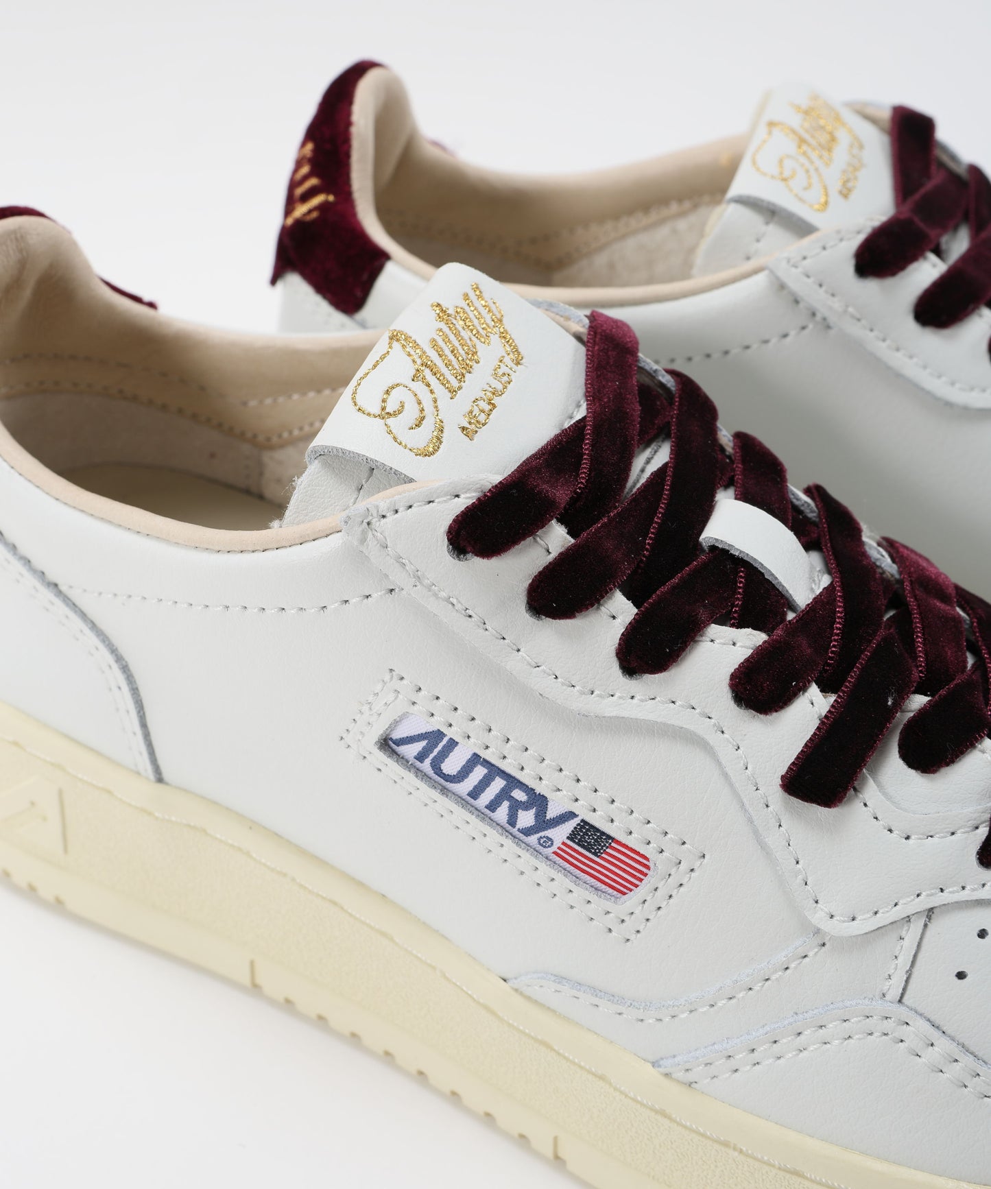 AUTRY MEDAGLIA AUTRY SNEAKERS FEMMINILI IN PELLE VIOLA BIANCA