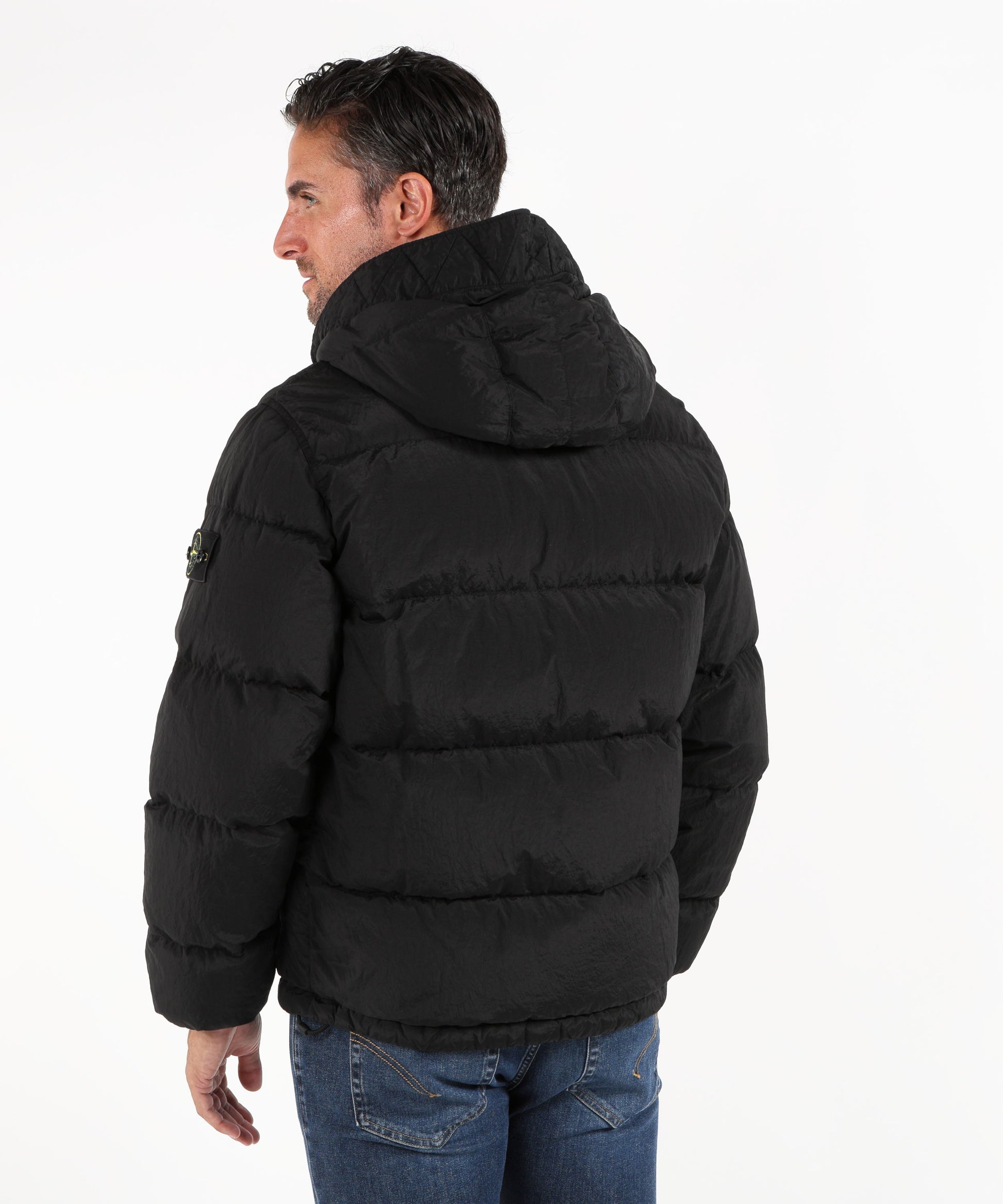 Piumini STONE ISLAND NYLON METAL IN ECONYL®
Piumino con cappuccio e fondo con coulisse Nero | STONE ISLAND