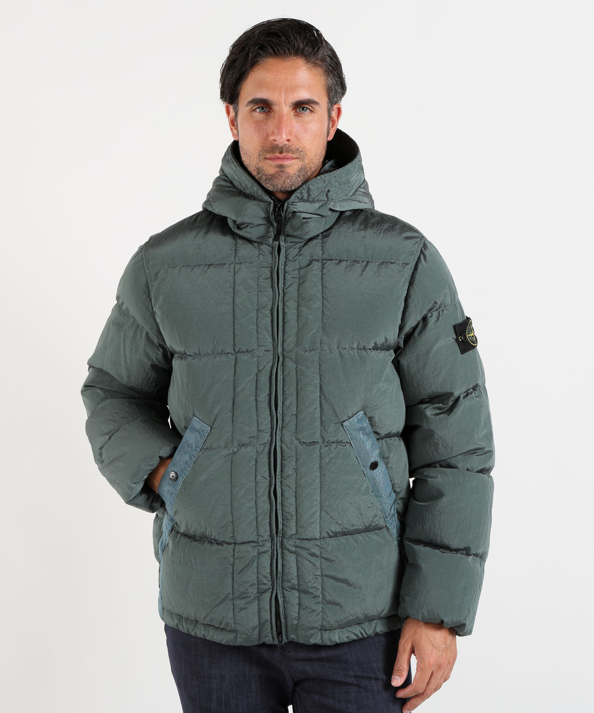 Puffer jackets STONE ISLAND “ECONYL® Nylon Metal Hooded Down Jacket with Drawstring Hem Verde oceano | STONE ISLAND