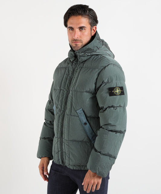 Puffer jackets STONE ISLAND “ECONYL® Nylon Metal Hooded Down Jacket with Drawstring Hem Verde oceano | STONE ISLAND